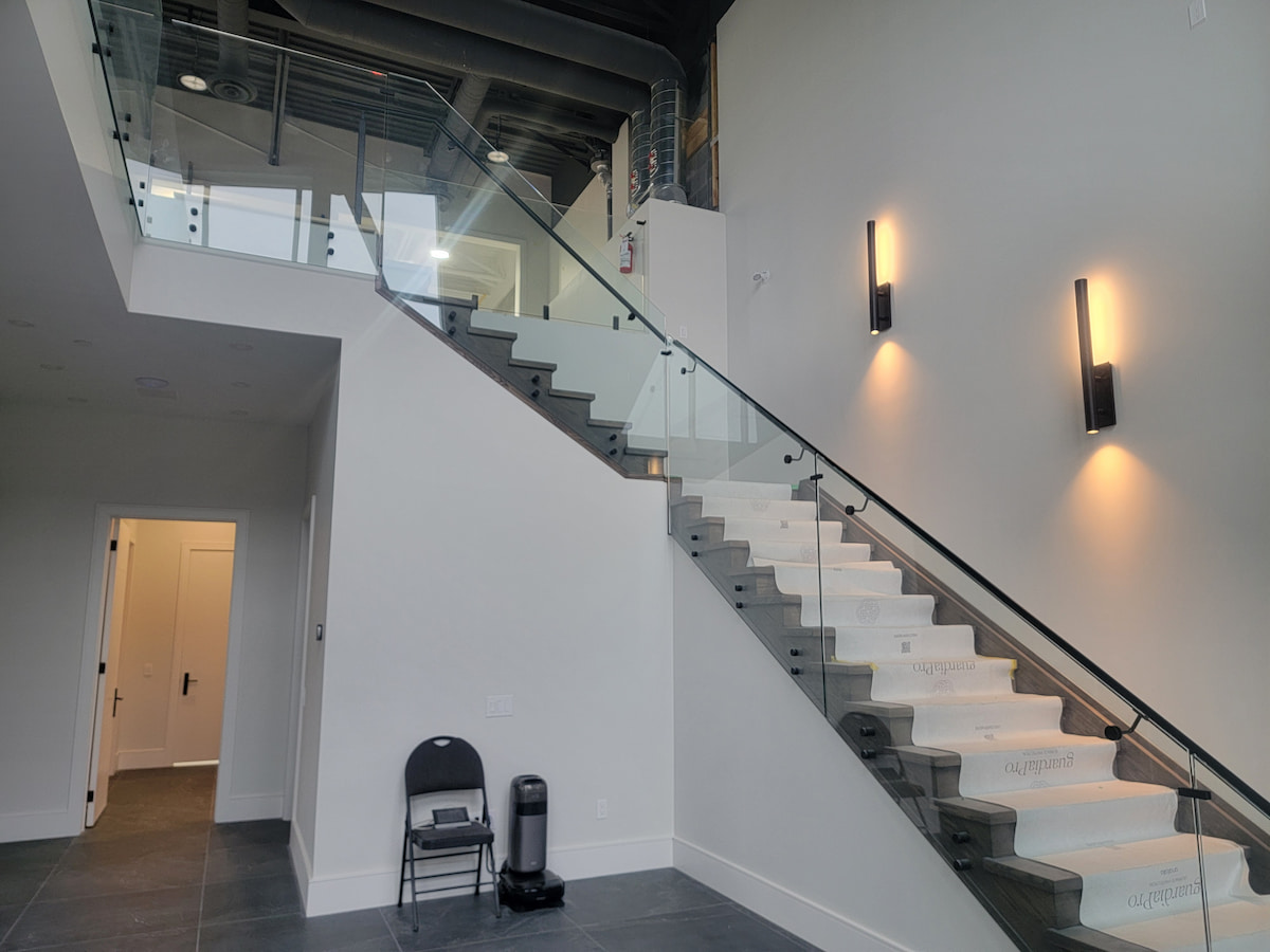 Staircase and reception area – mezzanine addition permit Aurora