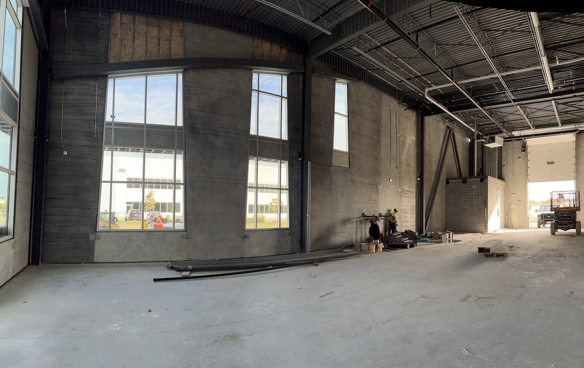 Warehouse shell before mezzanine addition – Aurora