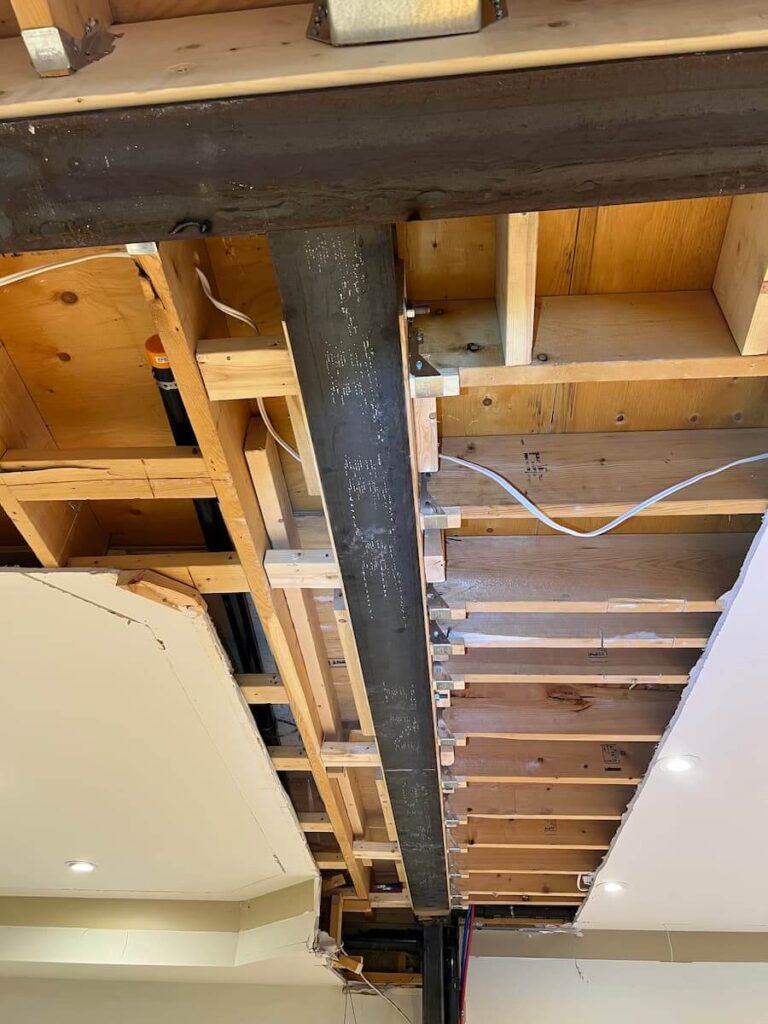 Structural steel beam installation for load bearing wall removal project in Richmond Hill Ontario